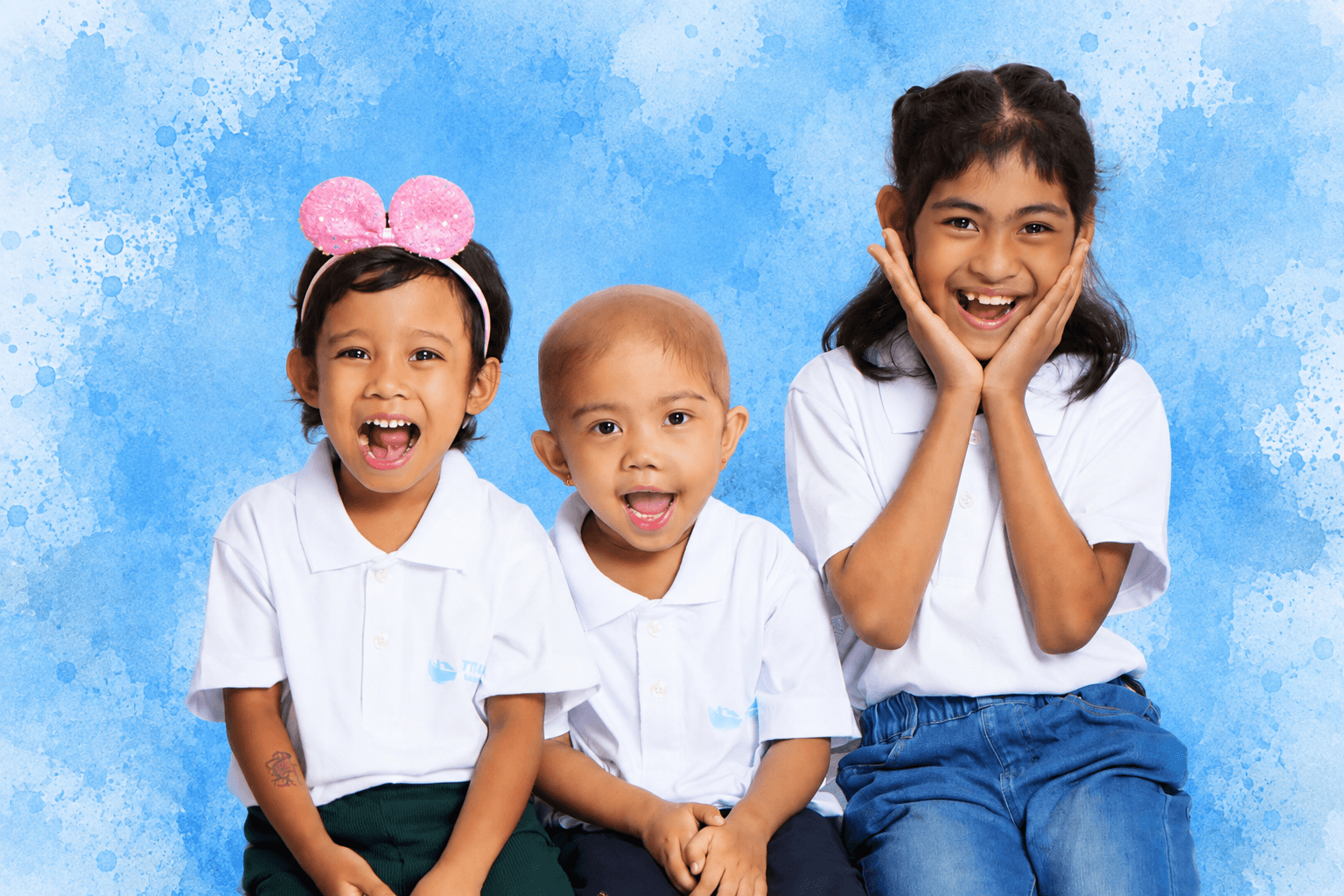 Three children supported by Little Ark Foundation
