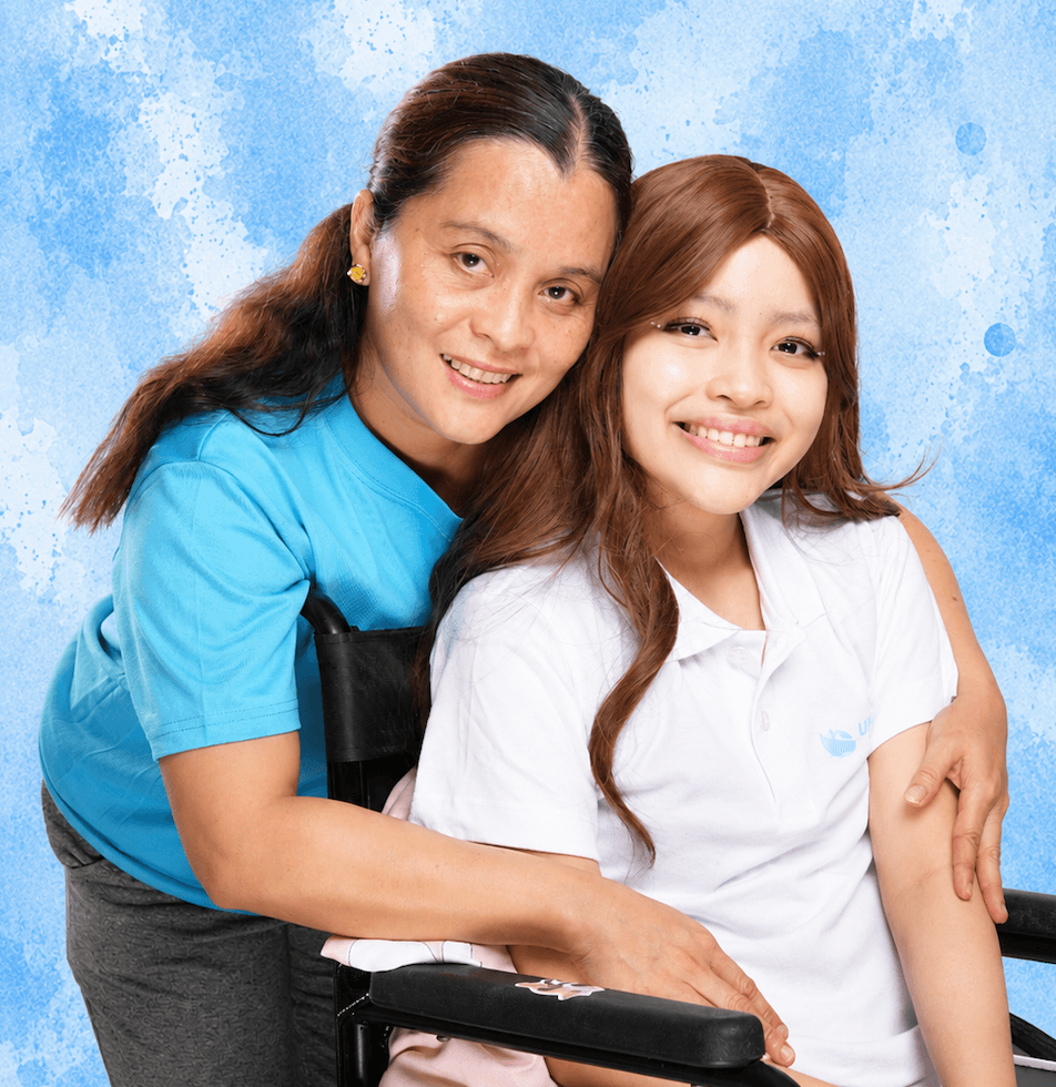 A Little Ark Foundation caregiver embracing a young woman