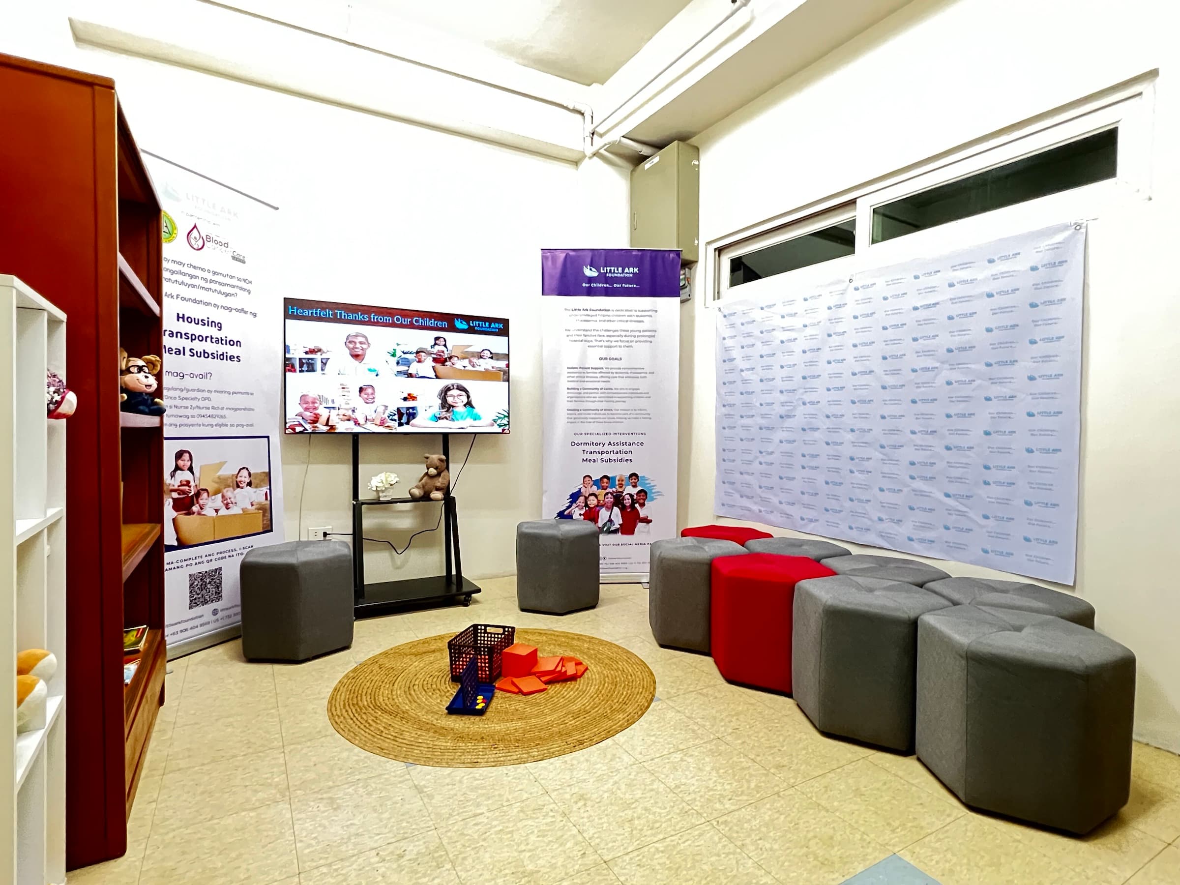 A small children’s play area inside the larger condo unit
