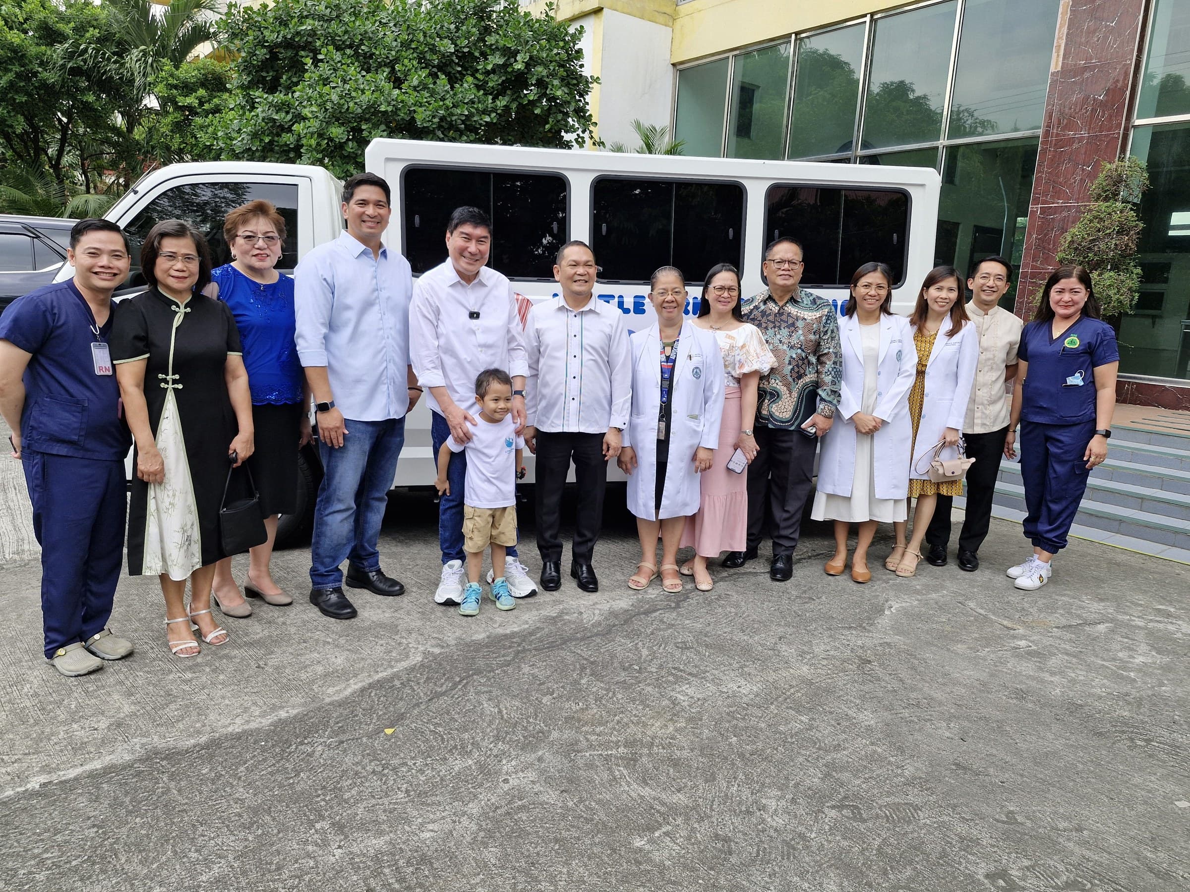 Little Ark Foundation and hospital representatives gathered with the Hope in Transit vehicle