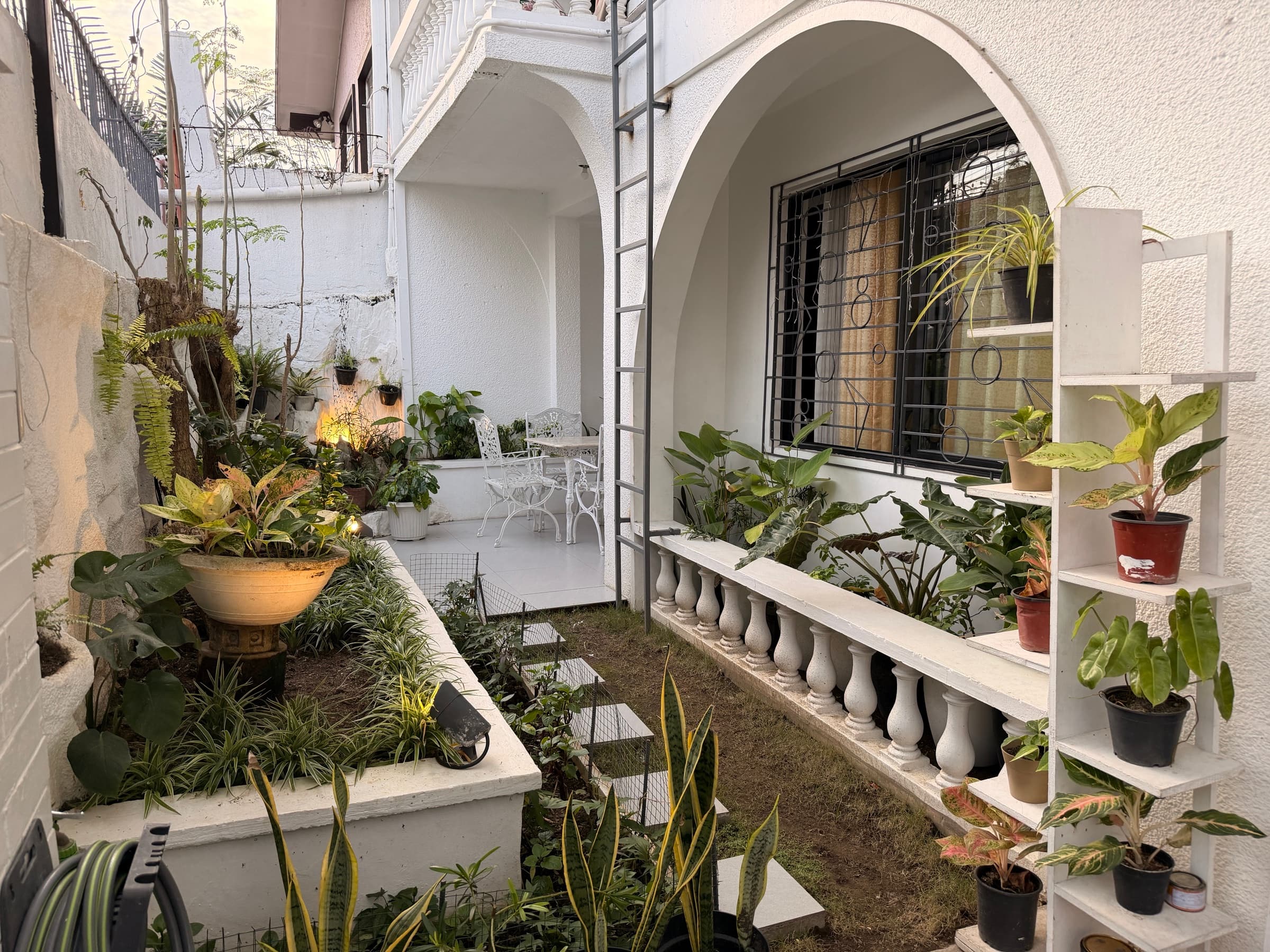 A landscaped courtyard beside the Little Ark home