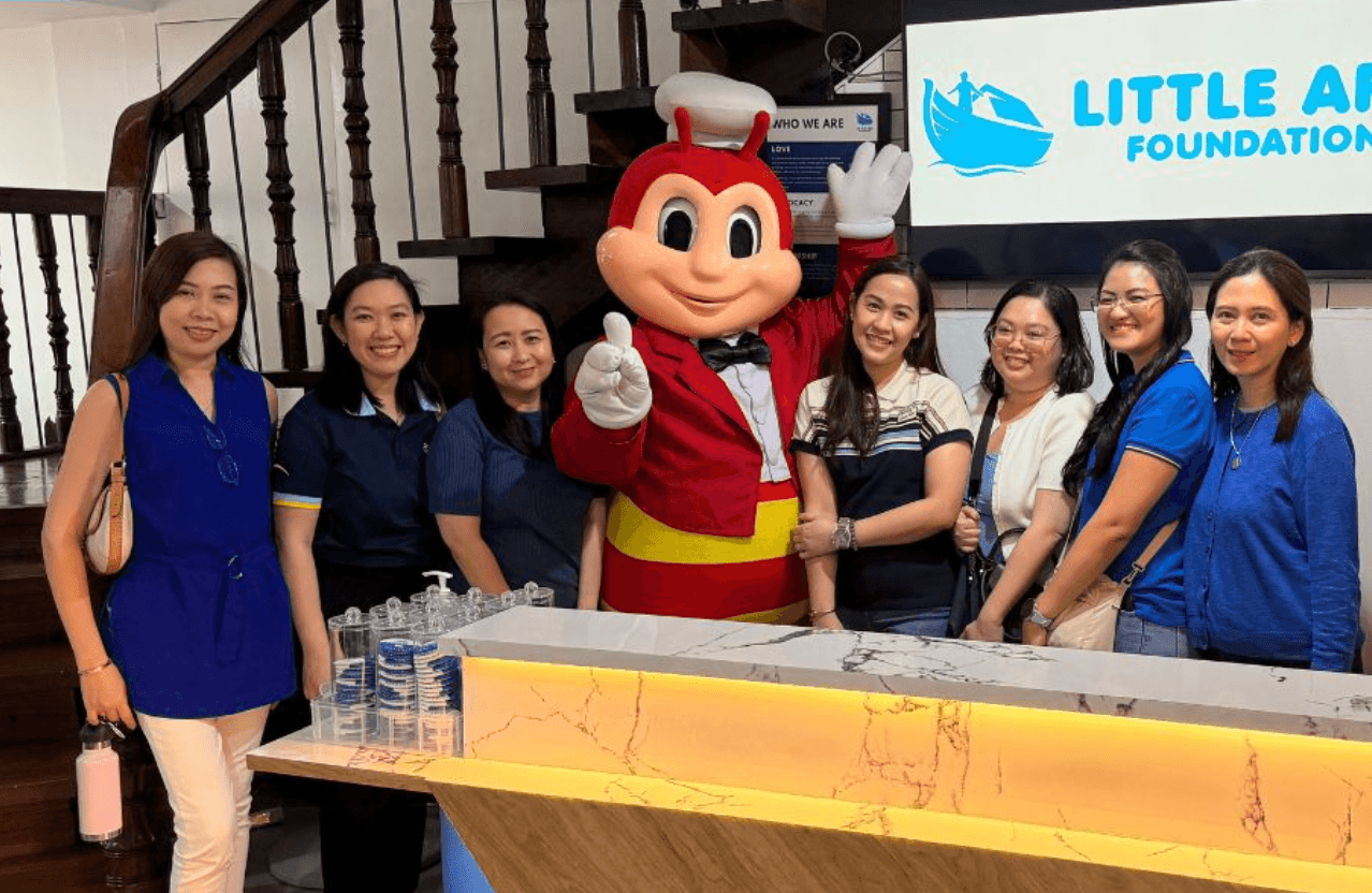 Little Ark partners gathered with Jollibee during a resource support visit