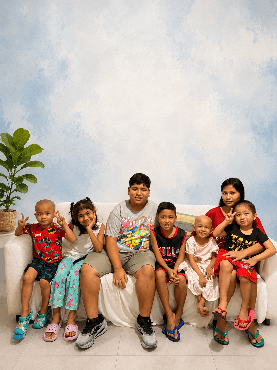 Children and a caregiver supported by Little Ark Foundation
